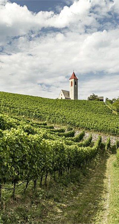 [Translate to Italian:] Geführte Wandertouren in Südtirol: Kirchenkunst am Berg
